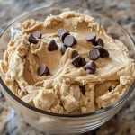 A bowl of protein cookie dough with chocolate chips